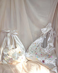 Hand-Beaded Underarm Triangle Bag (Large Bow) — bow detail